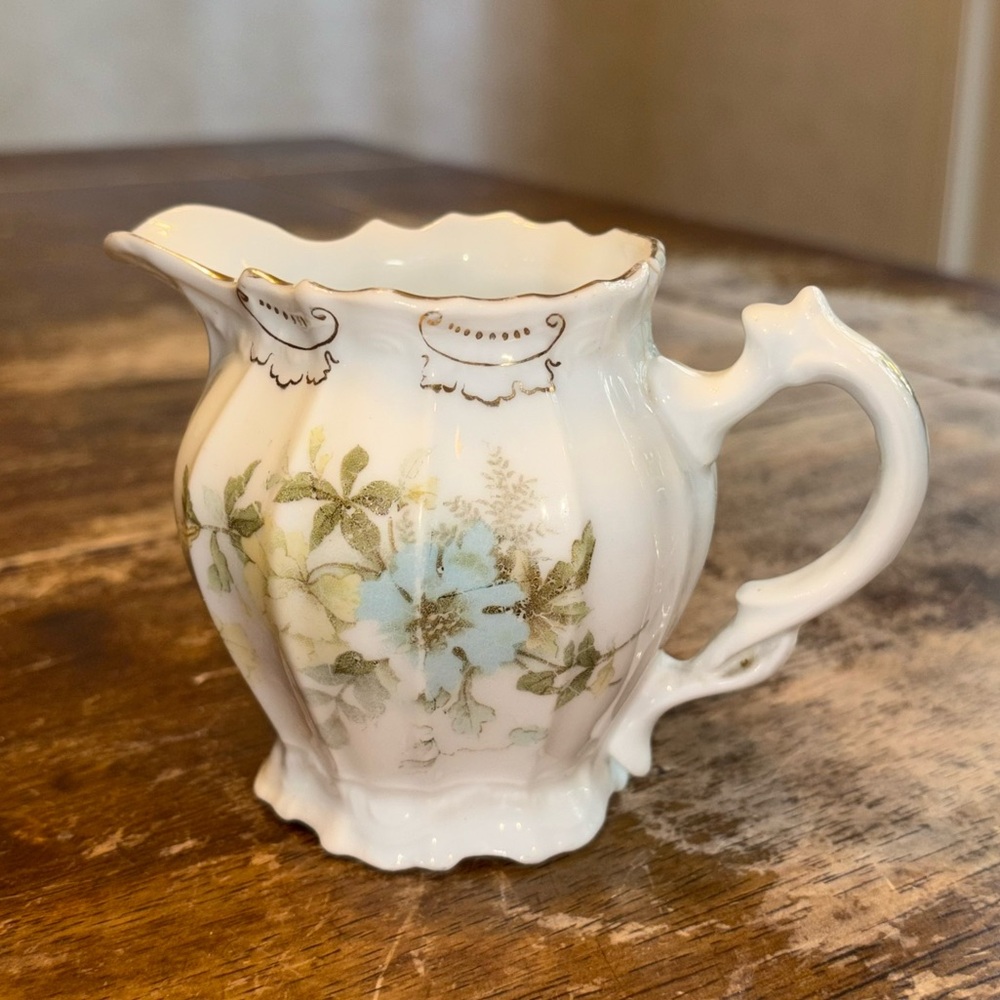 Antique porcelain ceramic creamer